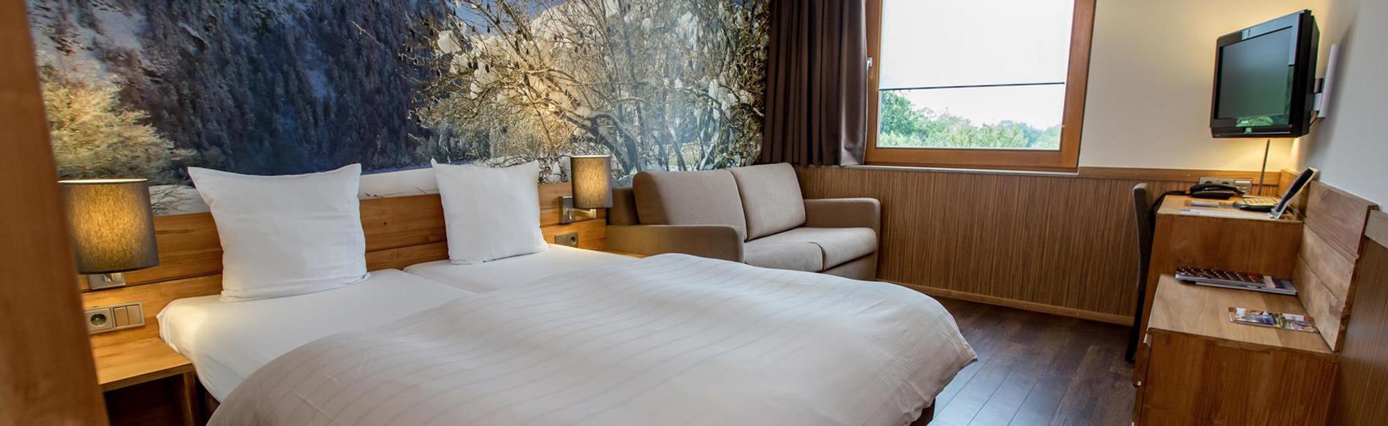 De slaapkamer van Hotel SnowWorld Landgraaf